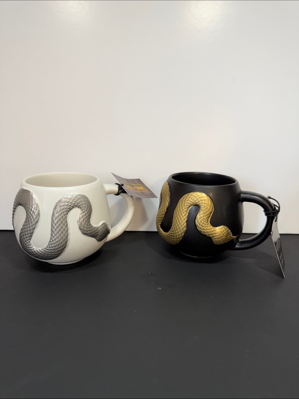 Black Ceramic Mug with Gold Snake Accent